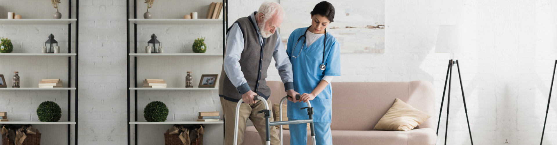 nurse assisting senior man